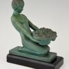 Art Deco boekensteunen naakte vrouw met mand