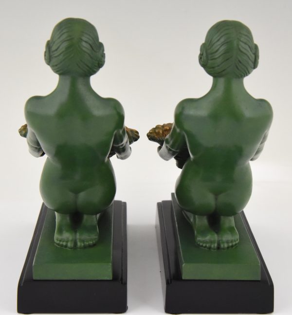 Art Deco bookends kneeling nudes with baskets