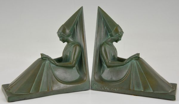 Art Deco bookends reading Medieval ladies