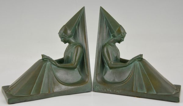 Art Deco bookends reading Medieval ladies