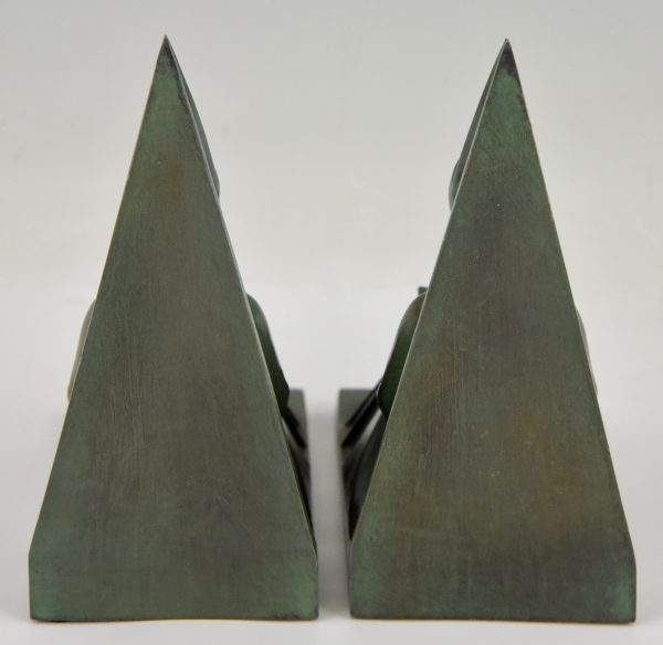 Art Deco bookends reading Medieval ladies