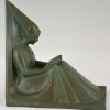 Art Deco bookends reading Medieval ladies