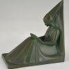 Art Deco bookends reading Medieval ladies