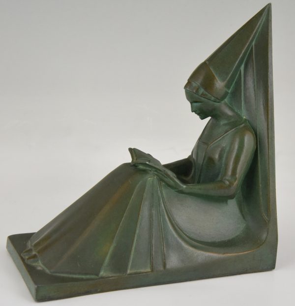 Art Deco bookends reading Medieval ladies