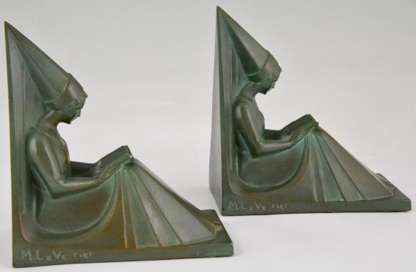 Art Deco bookends reading Medieval ladies