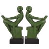 Art Deco bookends reading nudes