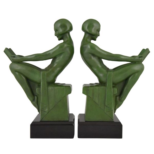 Art Deco bookends reading nudes