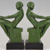 Art Deco bookends reading nudes