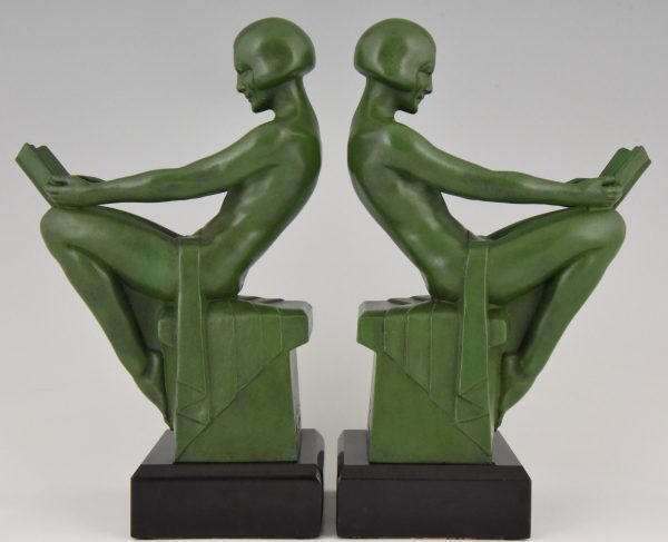 Art Deco bookends reading nudes