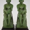 Art Deco bookends reading nudes