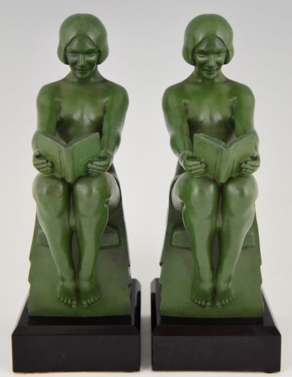 Art Deco bookends reading nudes