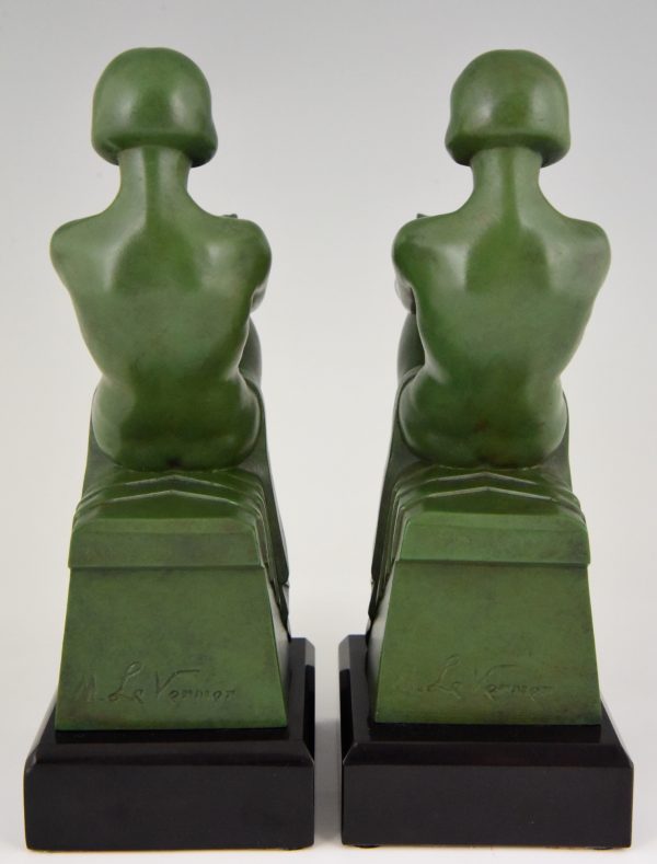 Art Deco bookends reading nudes