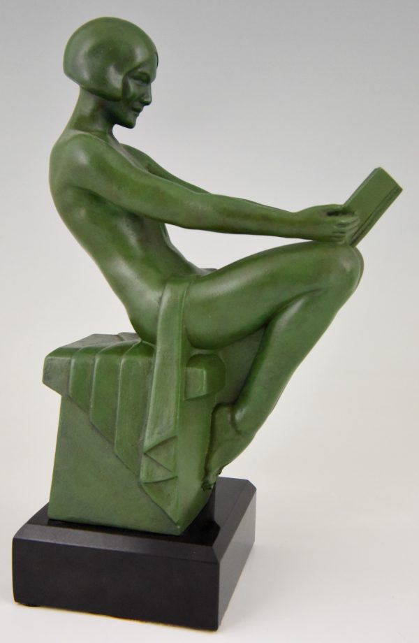 Art Deco bookends reading nudes