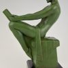 Art Deco bookends reading nudes