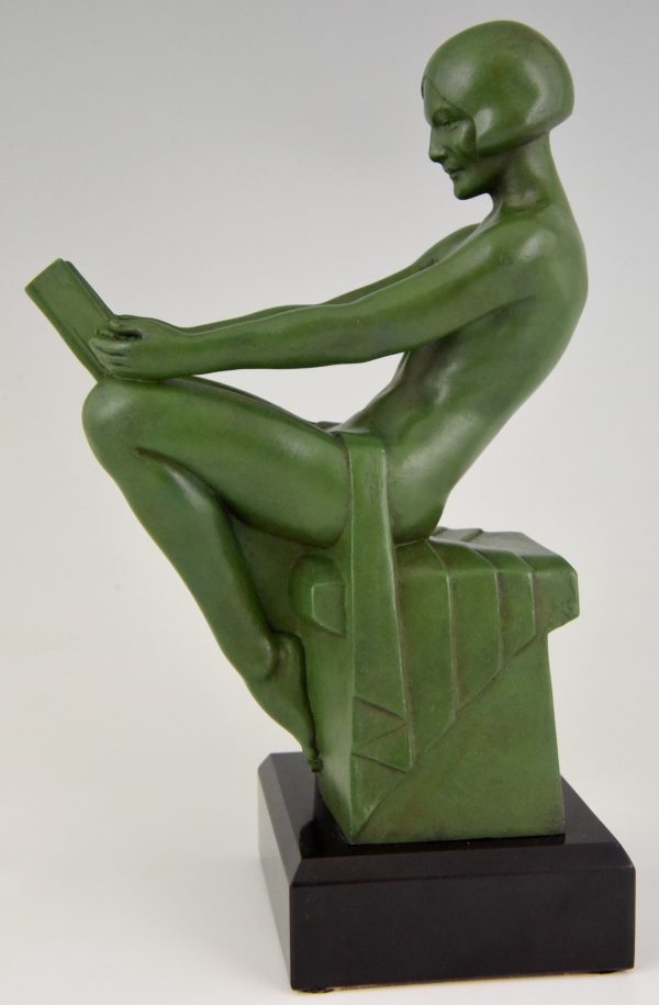 Art Deco bookends reading nudes