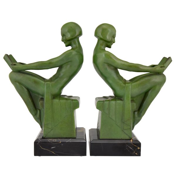 Art Deco bookends reading nudes