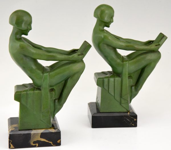 Art Deco bookends reading nudes