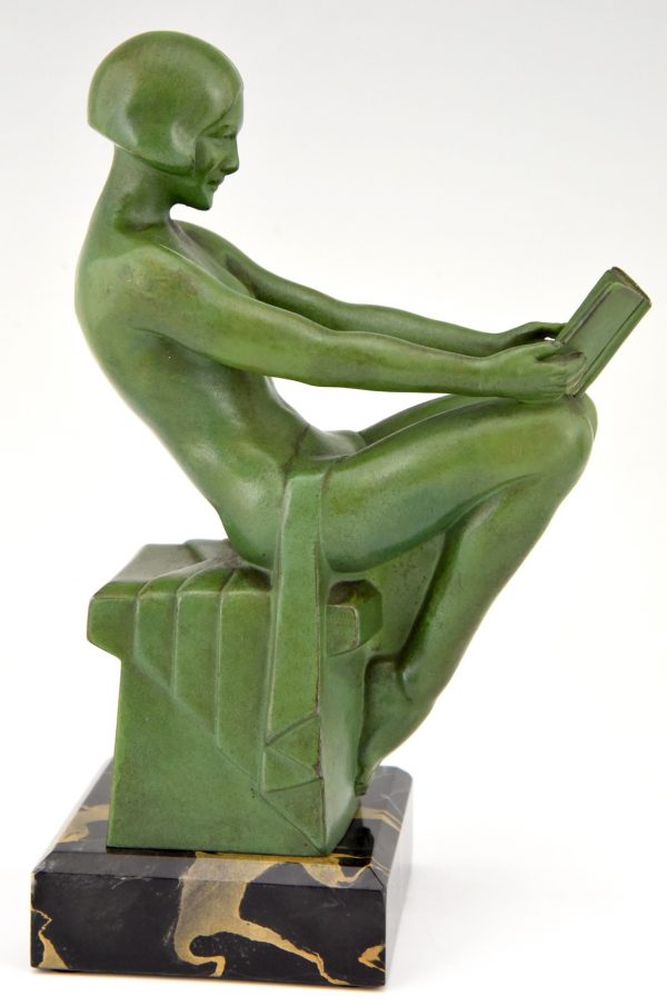 Art Deco bookends reading nudes