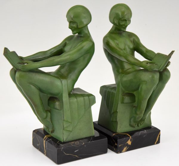 Art Deco bookends reading nudes