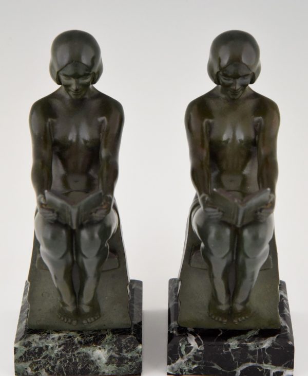 Art Deco bookends with reading nudes.