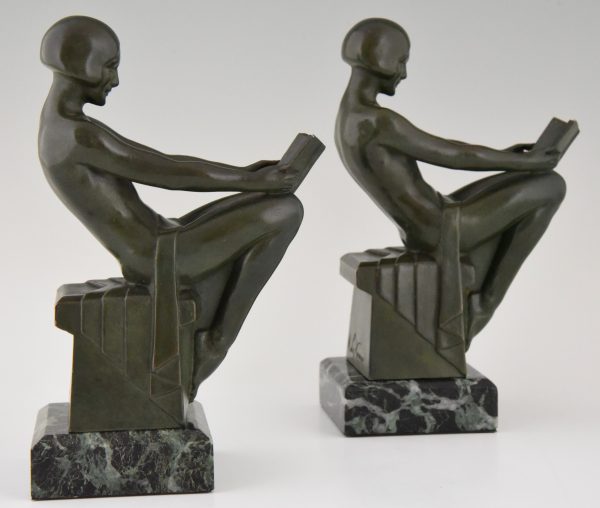 Art Deco bookends with reading nudes.