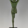 Art Deco bronze lamp female dancer holding a glass shade