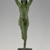 Art Deco bronze lamp female dancer holding a glass shade