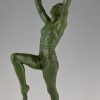 Art Deco bronze lamp female dancer holding a glass shade