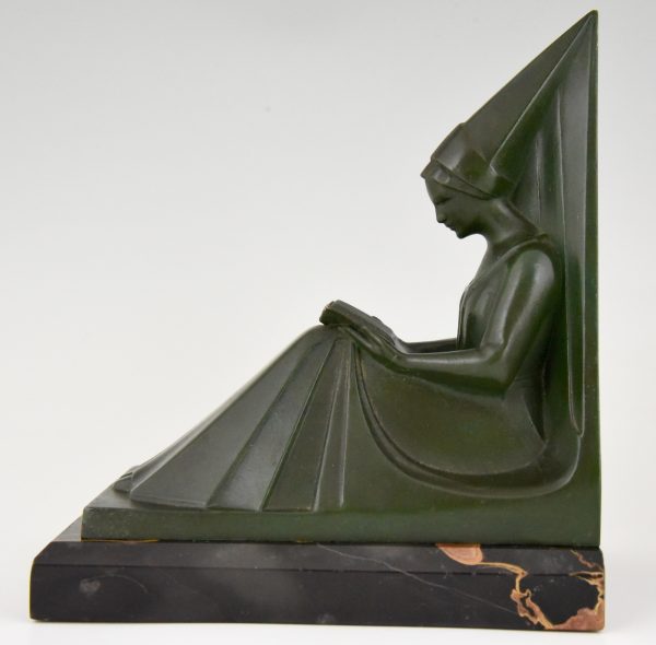 Art Deco figural bookends reading Medieval ladies