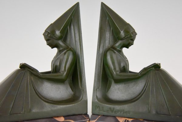 Art Deco figural bookends reading Medieval ladies