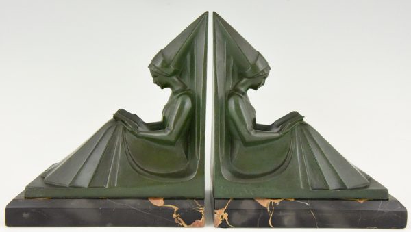 Art Deco figural bookends reading Medieval ladies