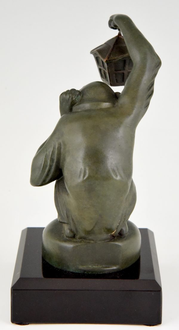 Art Deco sculptuur aap met lantaarn auto mascotte