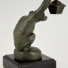 Art Deco sculptuur aap met lantaarn auto mascotte