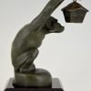 Art Deco sculptuur aap met lantaarn auto mascotte