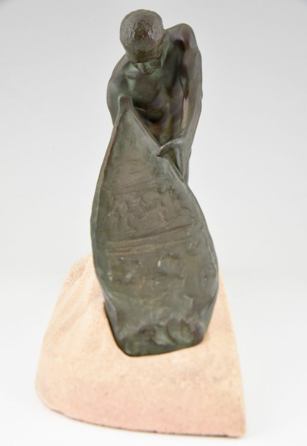 Art Deco sculpture male nude fisherman with boat