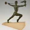 Art Deco sculpture male nude with trumpet and torch