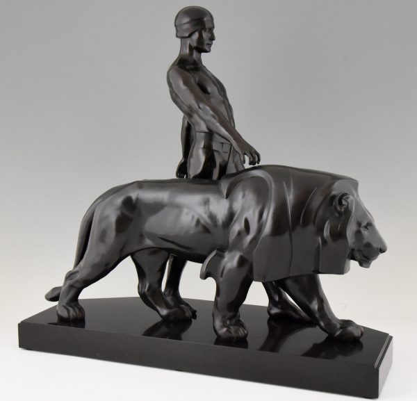 Art Deco sculpture of a male nude with lion, lion tamer.