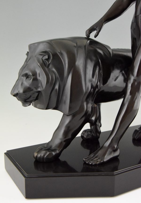 Art Deco sculpture of a male nude with lion, lion tamer.