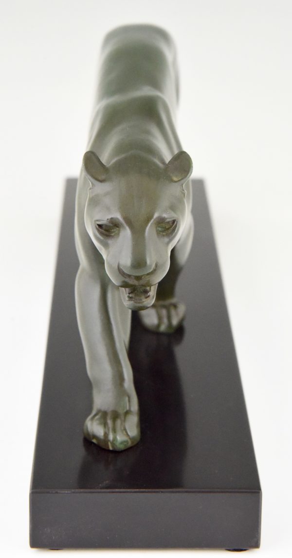 Art Deco sculpture of a walking panther