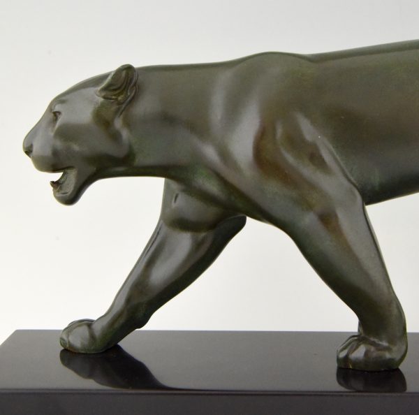 Art Deco sculpture of a walking panther