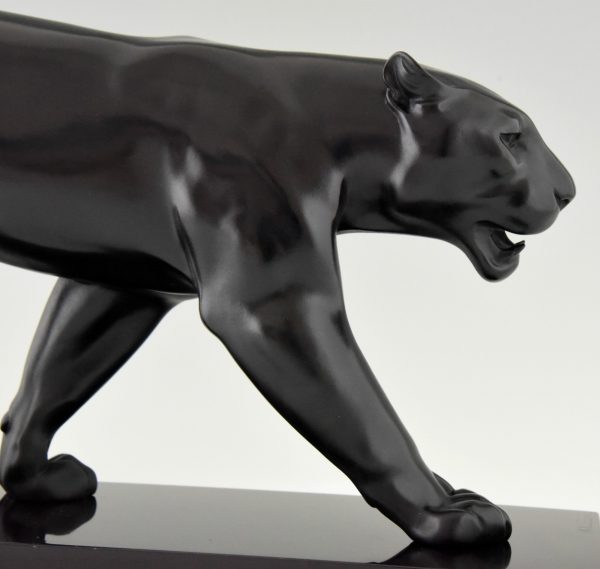 Art Deco sculpture of a walking panther