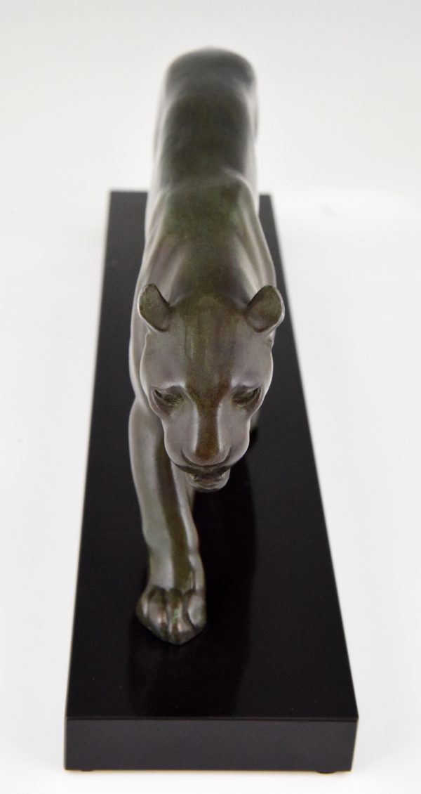 Art Deco sculpture of a walking panther