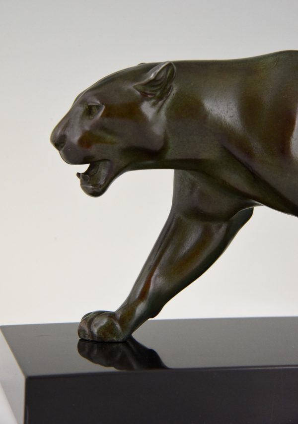 Art Deco sculpture of a walking panther