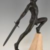 Art Deco sculpture sword fighter on a rock, the challenge