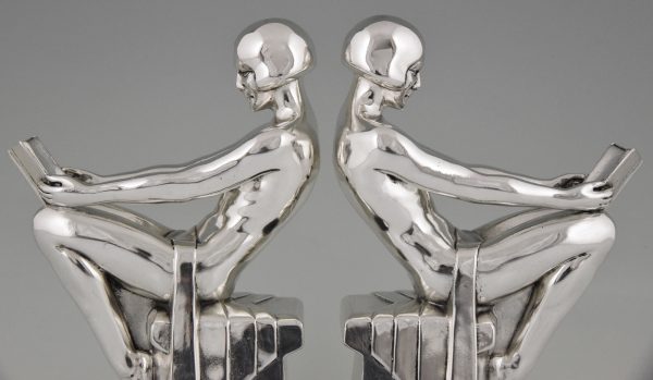 Art Deco silvered bookends with reading nudes