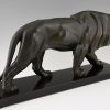 Art Deco sulpture of a walking lion