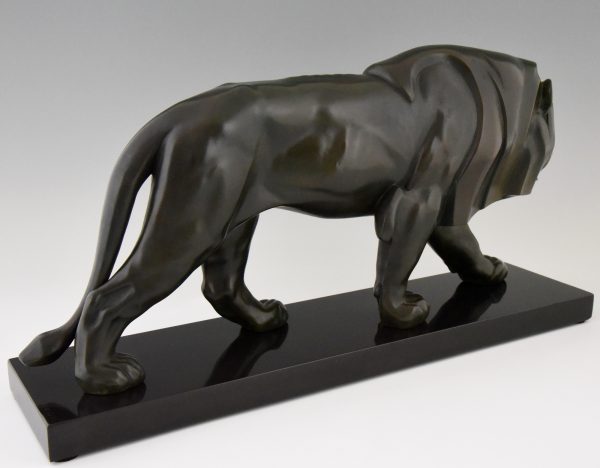 Art Deco sulpture of a walking lion