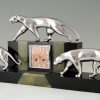 Art Deco clock with 3 bronze panthers, marble and onyx.