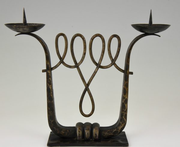 A fine pair of Art Deco wrought iron candelabra