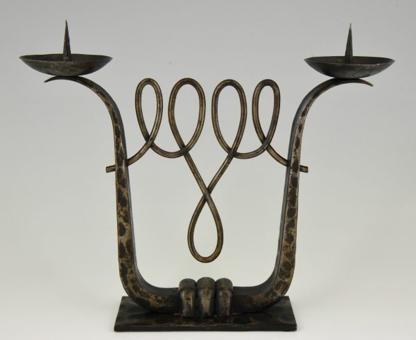 A fine pair of Art Deco wrought iron candelabra